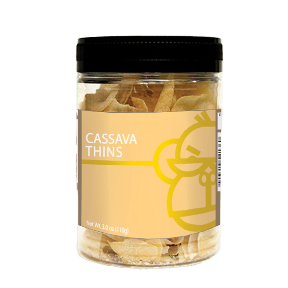 A jar of Orell's Cassava Thins, displaying the product through the transparent jar lid, with a label featuring the product name and a cartoon monkey.